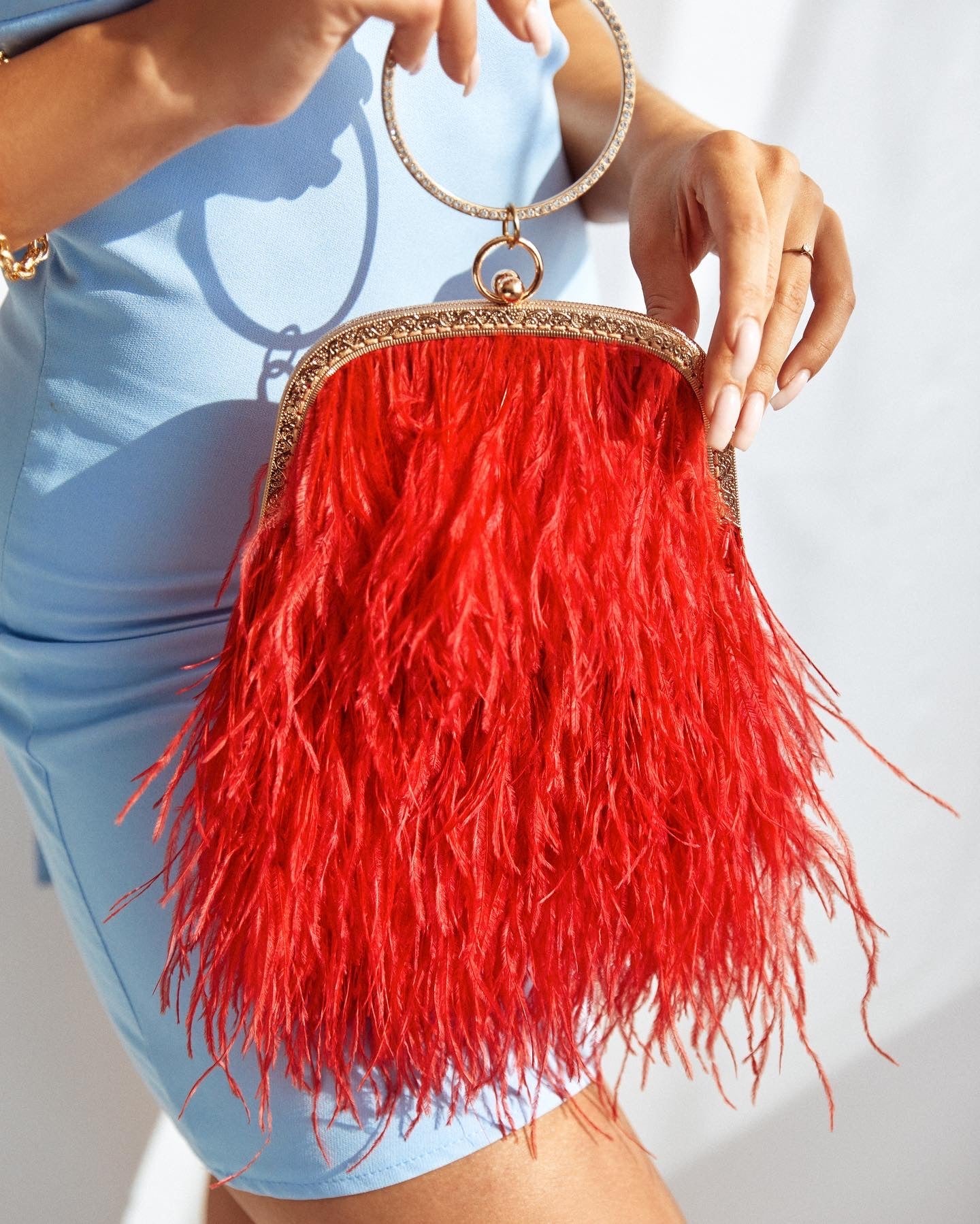 Red bag with a crystal decorated handle