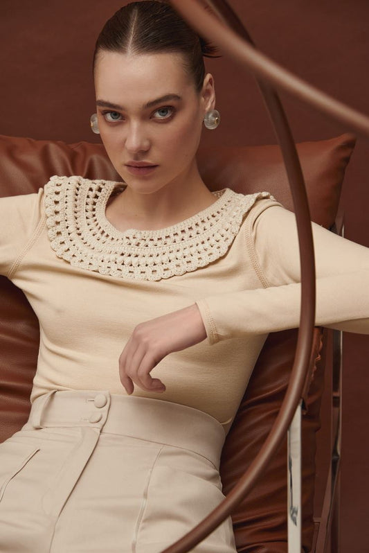 Knitted bodysuit in champagne color
