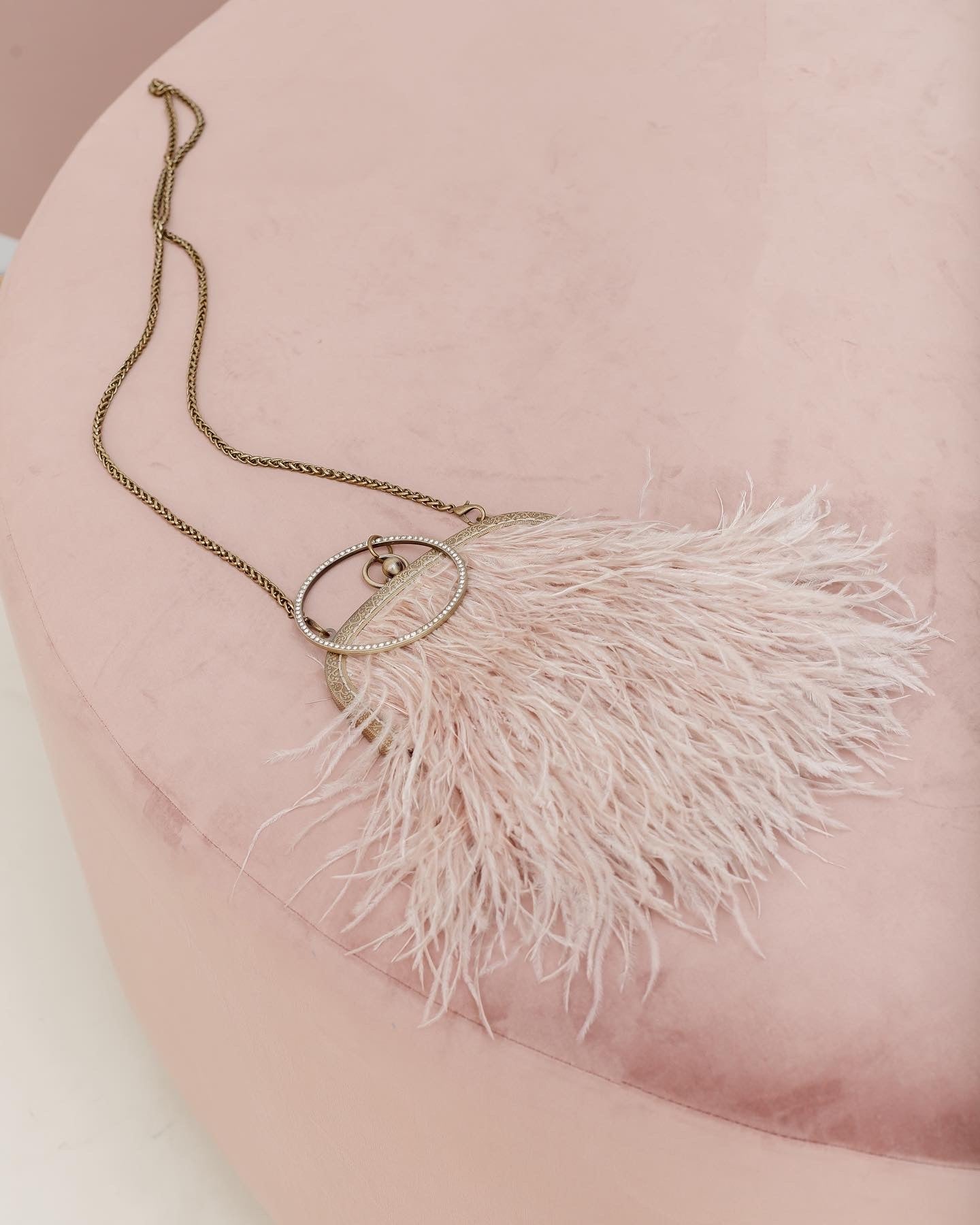 Powder bag with a crystal decorated handle