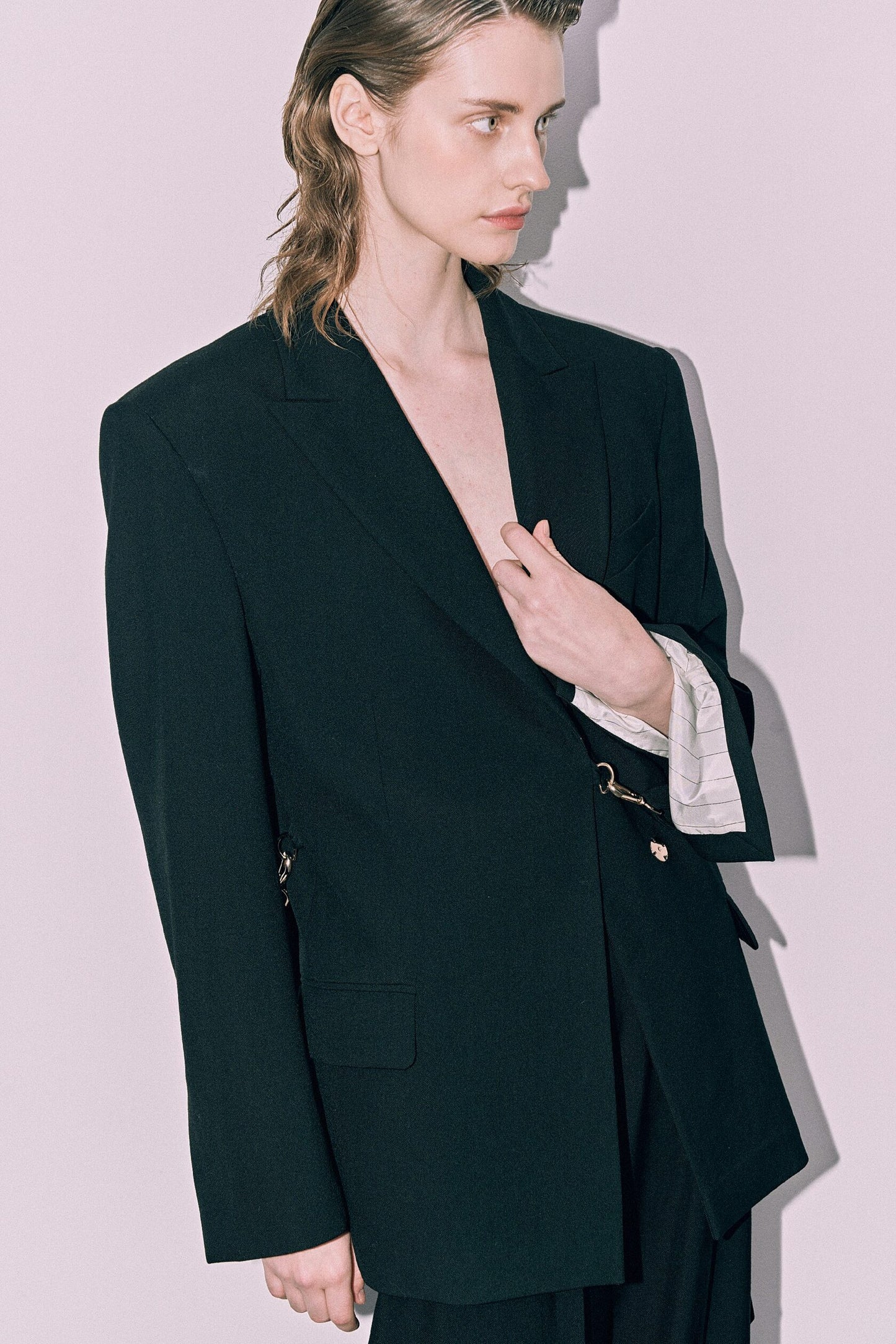 Black tailored blazer with carbines