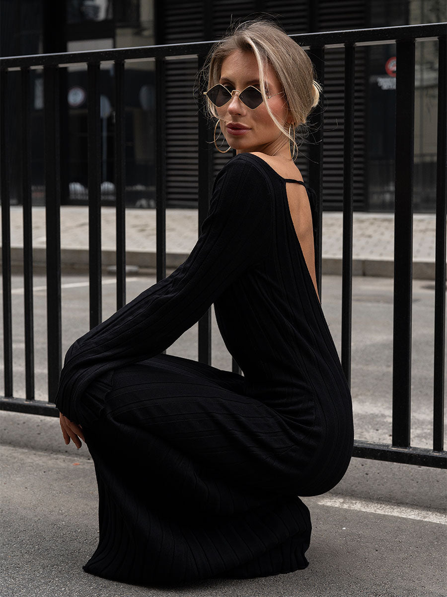 Black knitted midi dress with a cutout on the back