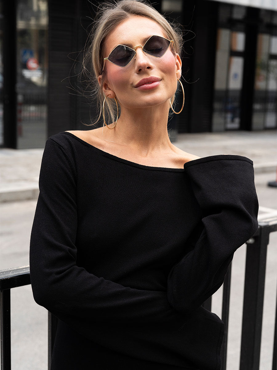 Black knitted mini dress with flared sleeves