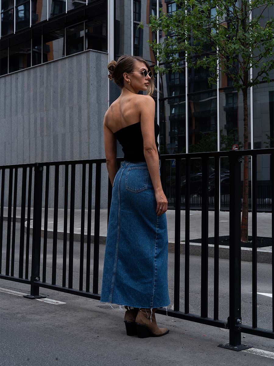 Blue denim midi skirt with a slit