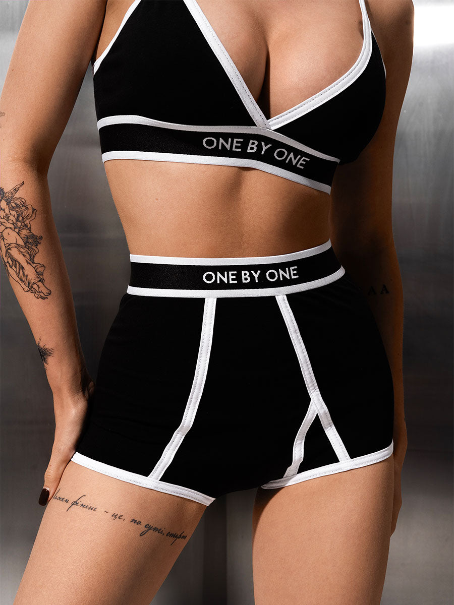 Black shorts with a branded elastic band