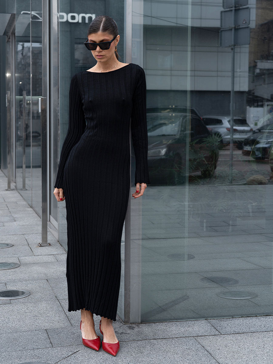 Black knitted midi dress with a cutout on the back
