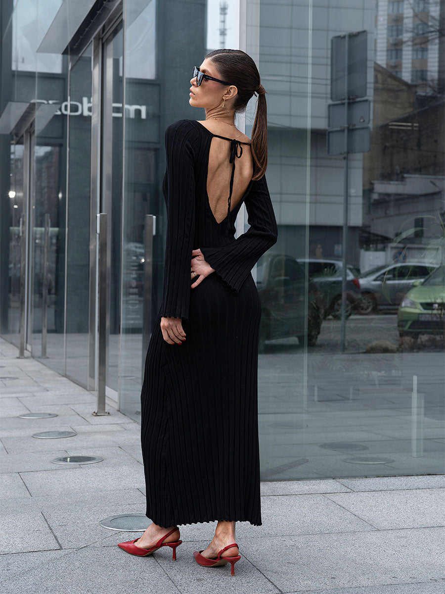 Black knitted midi dress with a cutout on the back
