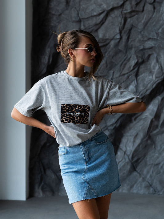 Light blue denim mini skirt