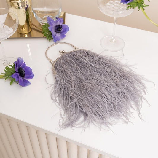 Grey bag with a flowers decorated handle